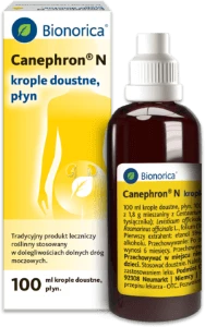 Canephron N, krople 100 ml w brązowej butelce, obok żółtego kartonika; kontur ciała z listkiem na opakowaniu